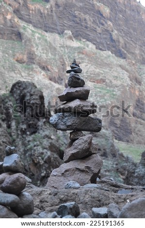 Balance of pebbles on the road for Teide volcano.