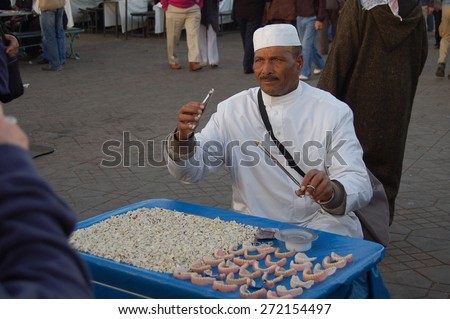 Marrakesh, Morocco - Jan, 02: The tooth man of Marrakesh offering his service at the Jamaa el Fna square on January, 02, 2010, Marrakesh, Morocco