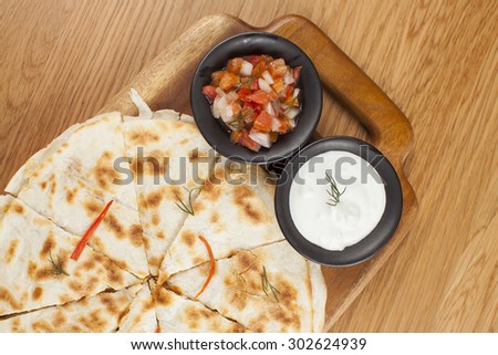 Thin Pizza crust with Tatar and Salsa sauce