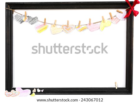 text frame with hanging heart shape paper and on the corner for your text