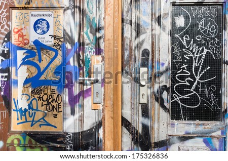 Doors covered with graffiti in Kreuzberg, Berlin, Germany