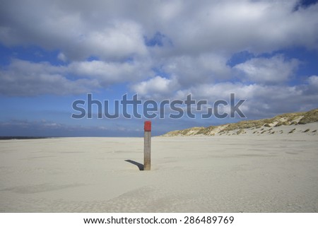beach pole with red top Terschelling