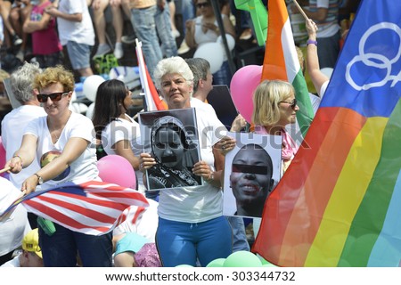 Amsterdam, Netherlands - August 2, 2014: participants in the annual event for the protection of human rights and civil equality - Gay Pride Parade on the Prinsengracht, Amsterdam