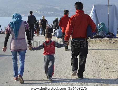 LESVOS, GREECE - october 14, 2015. Refugee migrants, arrived on Lesvos in dinghy boats, they wait in refugee camps for the ferry to Athens continuing their journey through Europe to seek asylum.
