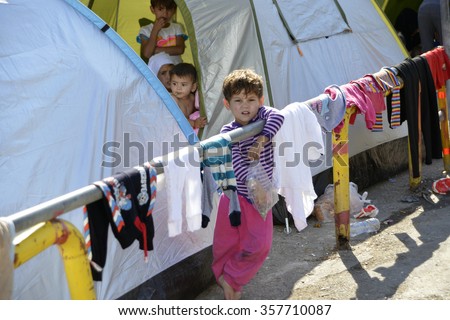 LESVOS, GREECE - OCTOBER 05, 2015. Refugee migrants, arrived on Lesvos in inflatable dinghy boats, they stay in refugee camps waiting for the ferry to mainland Athens.