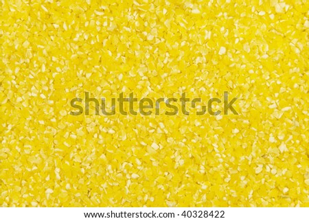 Background from ground grains of corn groats