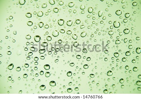 Rain drop on window green
