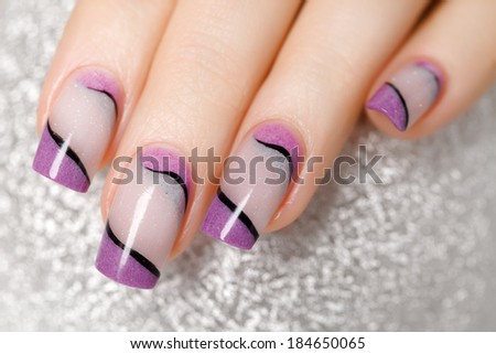 Female hands with beautiful manicure in gentle tones. Beauty photo