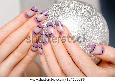 Female hands with beautiful manicure in gentle tones. Beauty photo