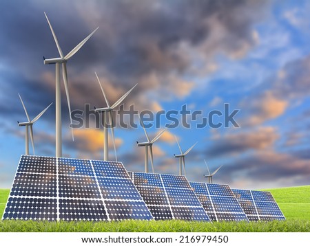 solar energy panels and wind turbine in sunset.