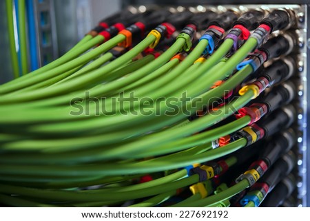 A set of green network cables to connect the terminal to the server