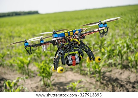 Demonstration of unmanned copter. Quadrocopters flying over fields. Zhitomir region Ukraine. 05/30/2013