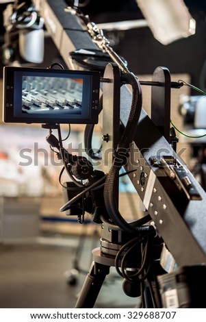 Professional Tripod Crane screen display on a television studio