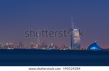 DUBAI, UAE - NOVEMBER 2 :The world's first seven stars luxury hotel Burj Al Arab seen alongside of Jumeirah Beach hotel and Burj Khalifa, November 2, 2012 in Dubai, United Arab Emirates