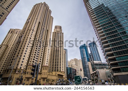 DUBAI, UAE - MARCH 16, 2015 : View of modern skyscrapers in Jumeirah beach residence on March 16, 2015 in Dubai, JBR - artificial canal city, carved along a 3 km stretch of Persian Gulf shoreline.
