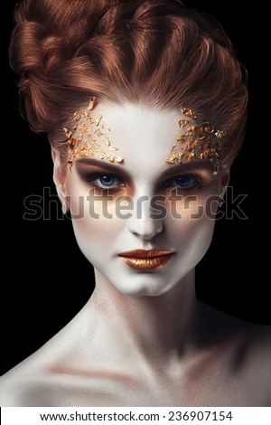 Girl with golden makeup, beauty face, portrait women, art, black background. looking.