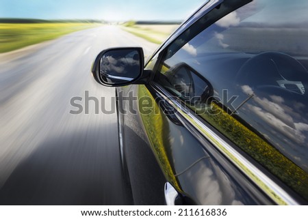 Blurred road and car, speed motion background