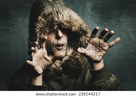 creepy man with hood