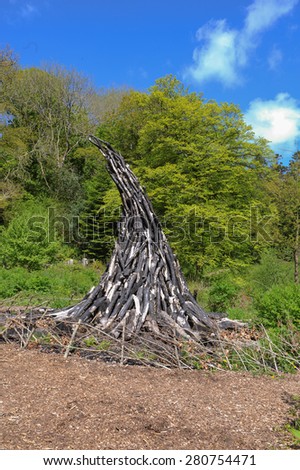 Charcoal Sculpture in the Lost Valley at the Lost Gardens of Heligan, Cornwall, England, UK