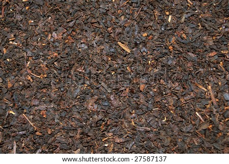 Dark loose leaf tea background