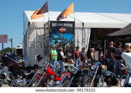 DAYTONA BEACH, FL - MARCH 17: Bikers check out the vendors downtown during \