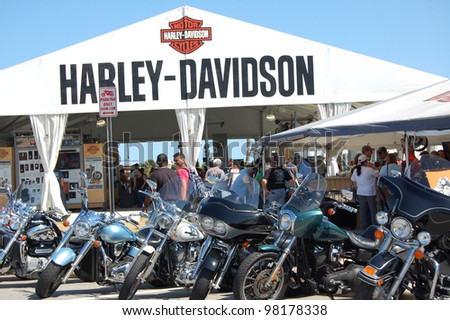 DAYTONA BEACH, FL - MARCH 17: Bikers check out the vendors downtown during 