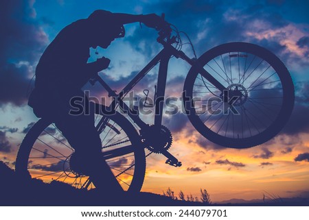 silhouette  Bicycle in sunset (retro and vintage style) and show power