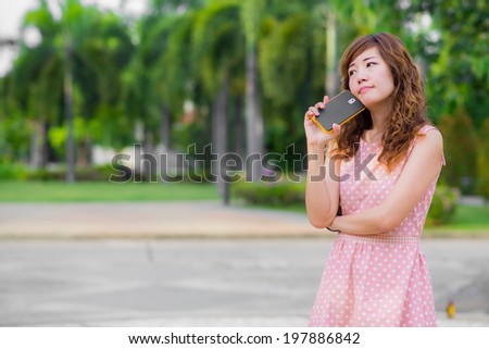 The girl thinking of someone to call