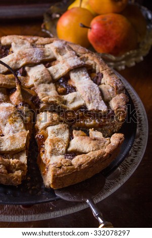 Apple/pear pie in a plate.