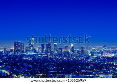 Los Angeles skyline at night with a clear sky.