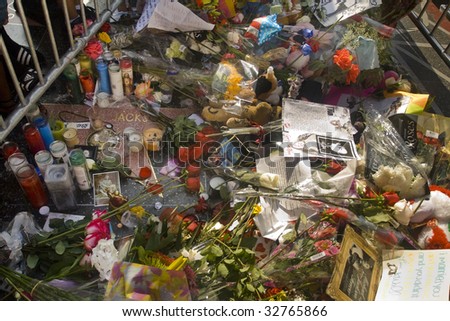 LOS ANGELES - JUNE 27:  Flowers and candles cover Michael Jackson\'s star on the Hollywood Walk of Fame on June 27, 2009 in Los Angeles. Jackson died on June 25 and the cause of death is undetermined.