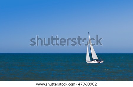 Sailboat on Pacific Ocean on a clear,sunny day.