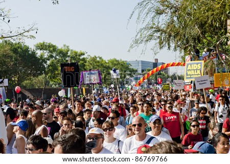 WEST HOLLYWOOD, CA - OCTOBER 16: Thousands of marchers walk through the streets of West Hollywood and Los Angeles to benefit the fight against AIDS by AIDS PROJECT LOS ANGELES on October 16, 2011.