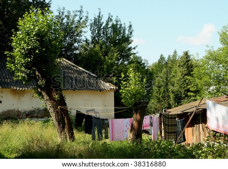 Washed clothing dries outside in the yard in Russian town