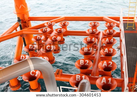 Oil and Gas Producing Slots at Offshore Platform, Oil and Gas Industry. Well head slot on the platform or rig. Production and Explorer industry.