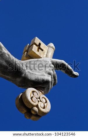 Fragment of a sculpture of apostle Peter - a hand with two keys - established on a St Peter\'s place in Vatican