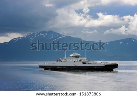 The ferry transporting transport and passengers, in waters of the Norwegian fjord
