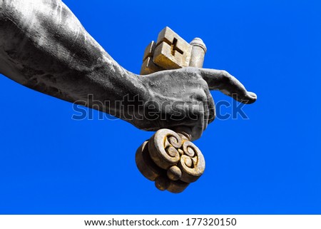 Fragment of a sculpture of apostle Peter - a hand with two keys - established on a St Peter\'s place in Vatican