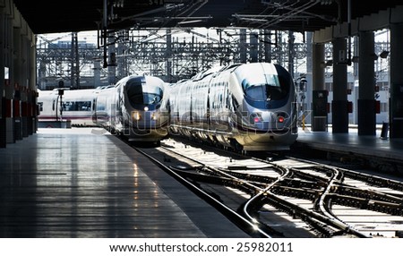 The high-speed train moving to a platform at railway station in Madrid, Spain