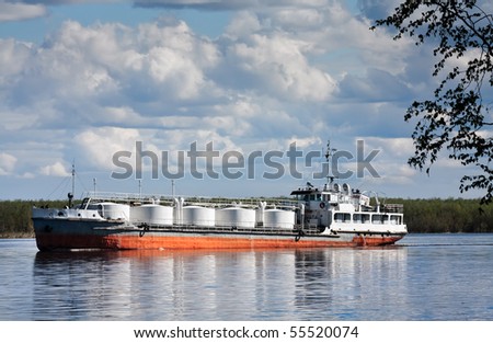 The bulk-oil vessel transporting cargo on the river Ob, Russia, Siberia