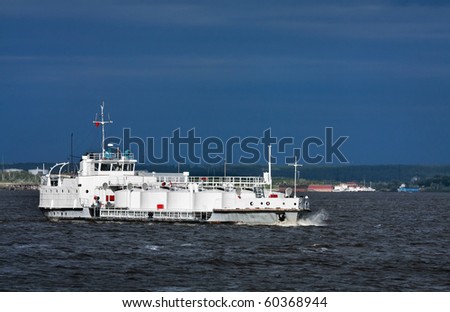 The bulk-oil vessel transporting cargo on the river Ob, Russia, Siberia