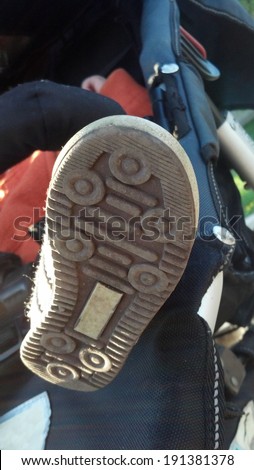 Leg child sneaker sole sticking with buggy