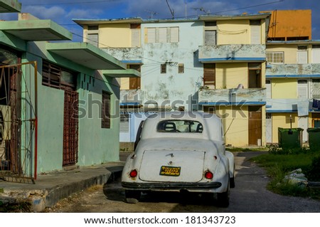 HAVANA, CUBA - DECEMBER 2, 2013: Classic old American car parked on one of the Cuban streets
