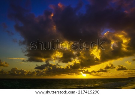 Amazing sunrise on the beach of Caribbean Sea