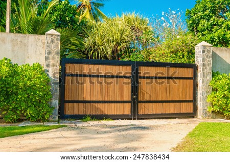 Wooden entrance of a luxury luxury properties in exotic scenery