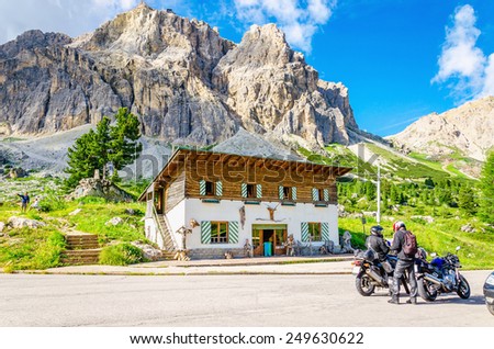 ITALY, CORTINA D\'AMPEZZO- JULY 24, 2014: Bikers touring European Alps, Dolomites Mountains, Italy