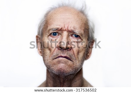 grizzled and unshaven the sad old man with blue eyes