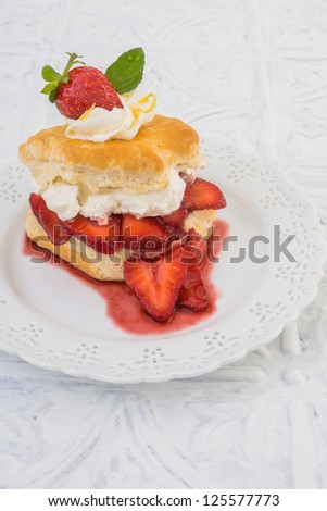 Strawberry Shortcake on buttermilk biscuit with fresh strawberries and balsamic glaze