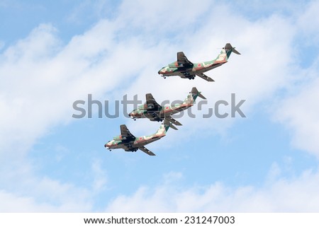 SAITAMA, JAPAN - NOVEMBER 3, 2014: Japanese Air Self-Defense Force holds their annual airshow at their Iruma airbase. They have a demonstration flight by military cargo airplanes called C-1.