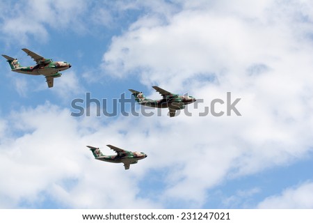 SAITAMA, JAPAN - NOVEMBER 3, 2014: Japanese Air Self-Defense Force holds their annual airshow at their Iruma airbase. They have a demonstration flight by military cargo airplanes called C-1.